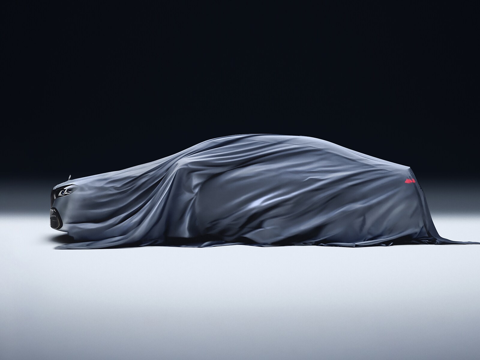 A car covered in a cloth