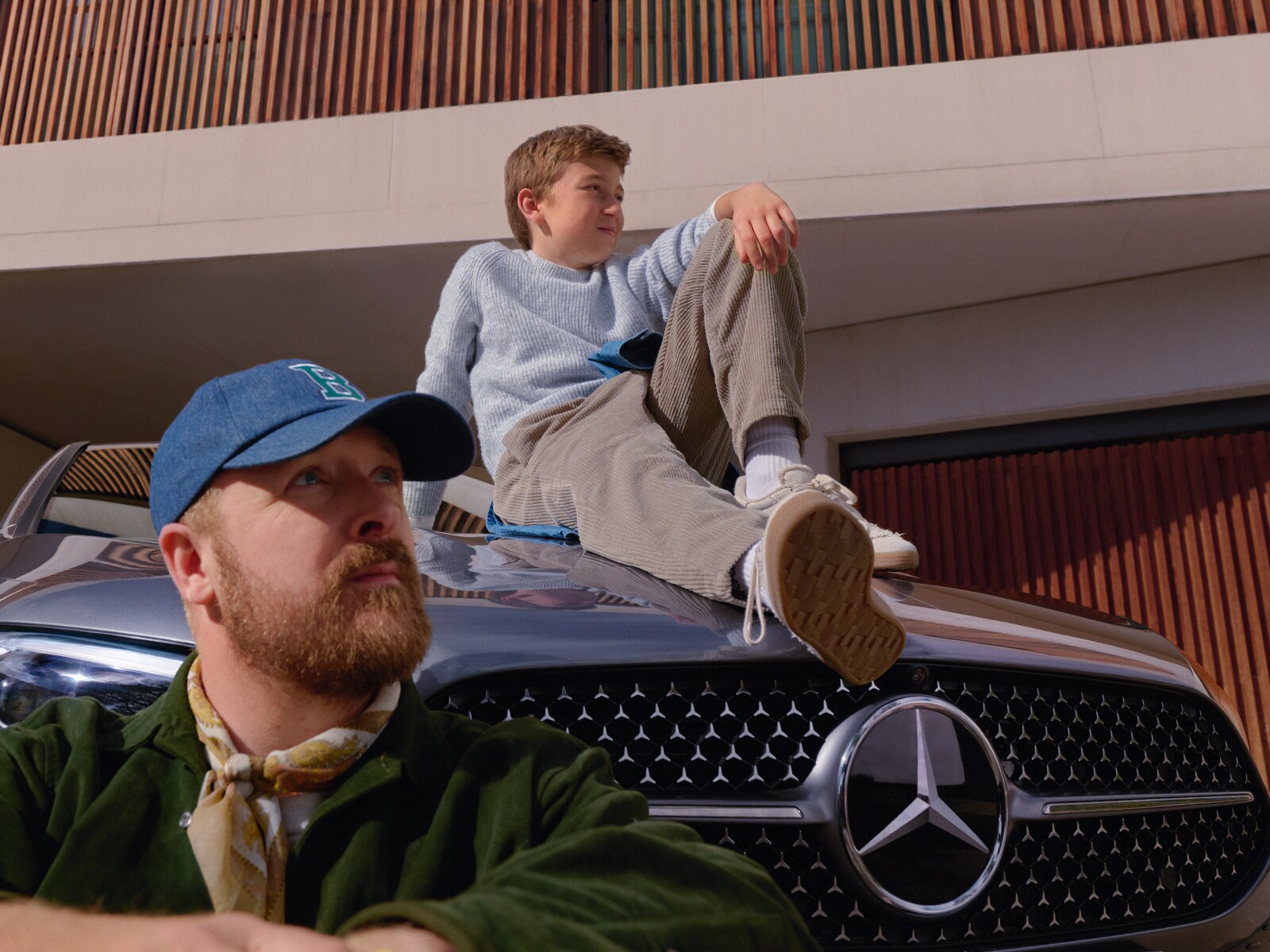 Image showing two people posing with a Mercedes-Benz car