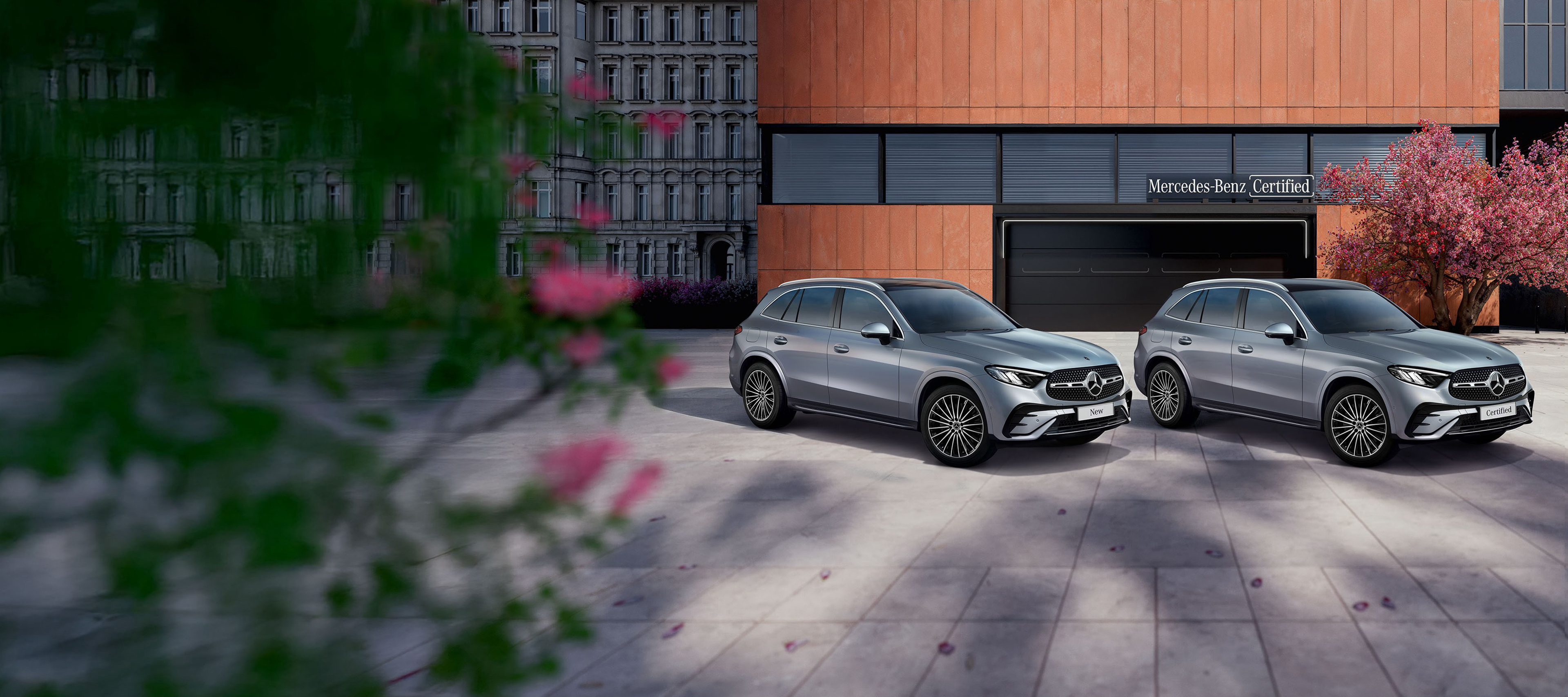 Mercedes-Benz Certified Pre-Owned GLC and EQB SUVs parked at the Certified Pre-Owned garage