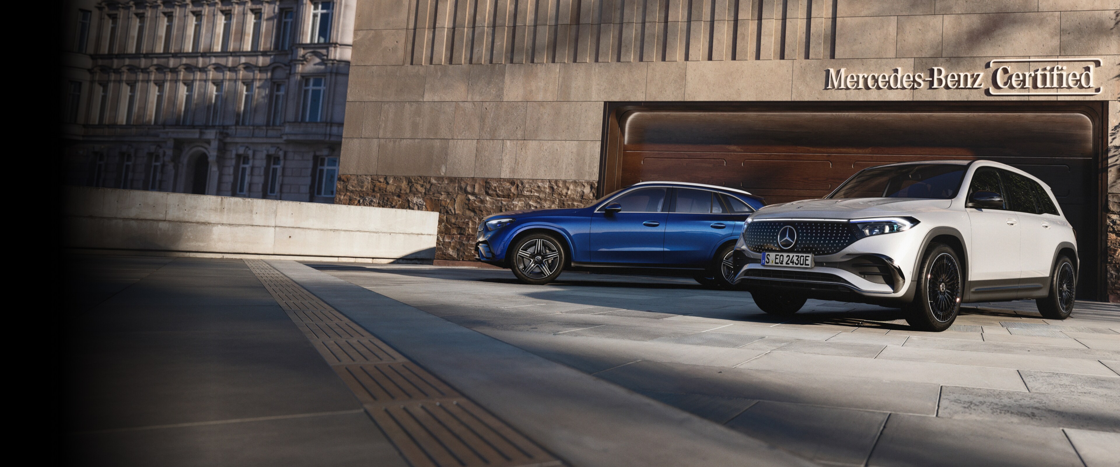 GLC and EQB SUVs parked at the Certified Pre-Owned garage