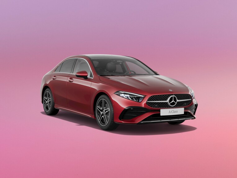 Red A-Class Sedan on a pink background.