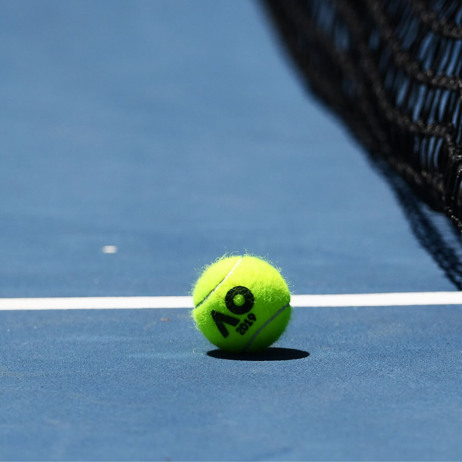 A tennis ball on court at the Australian Open