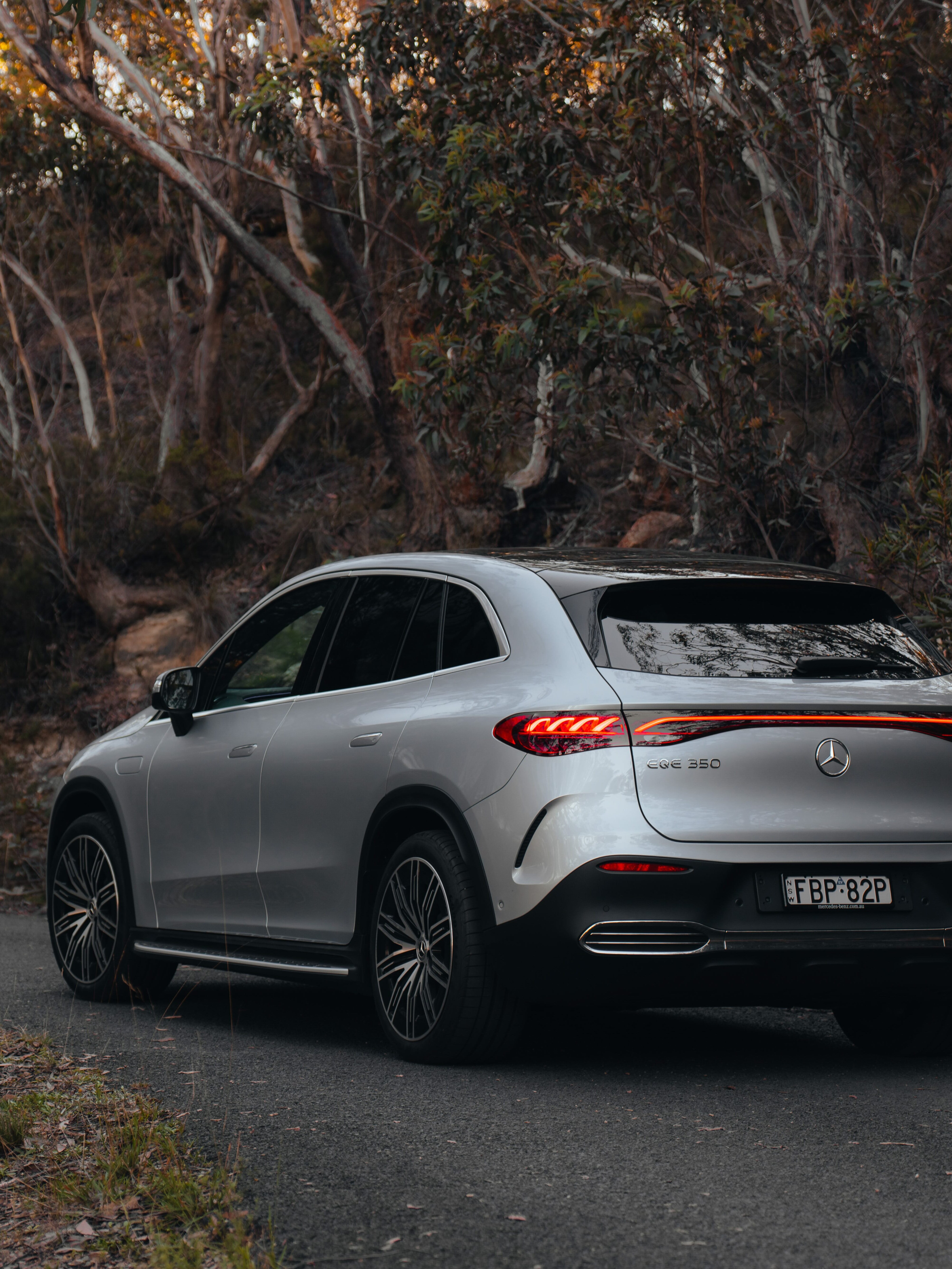 A car driving down a country road