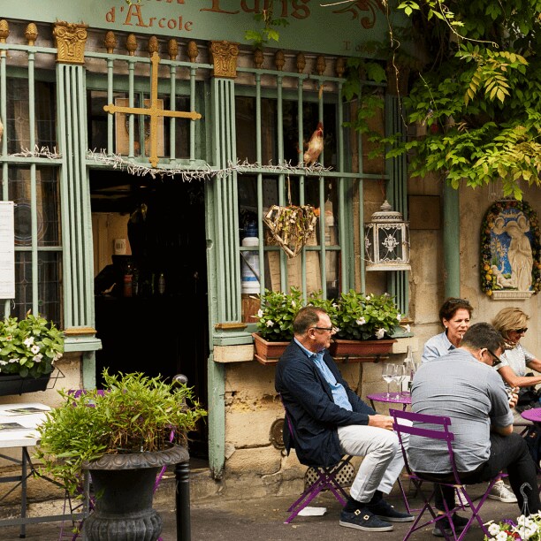 People dining outside on a Paris street