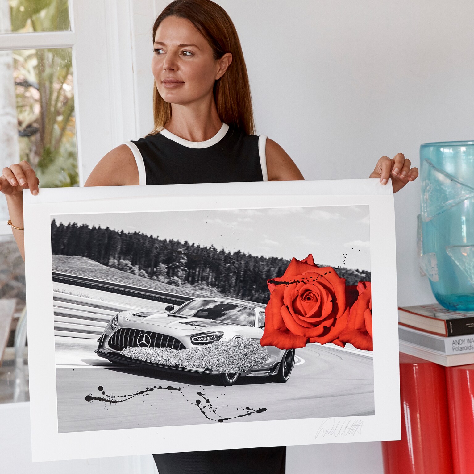 Dina Broadhurst with artworks of the Mercedes-AMG GT Black Series