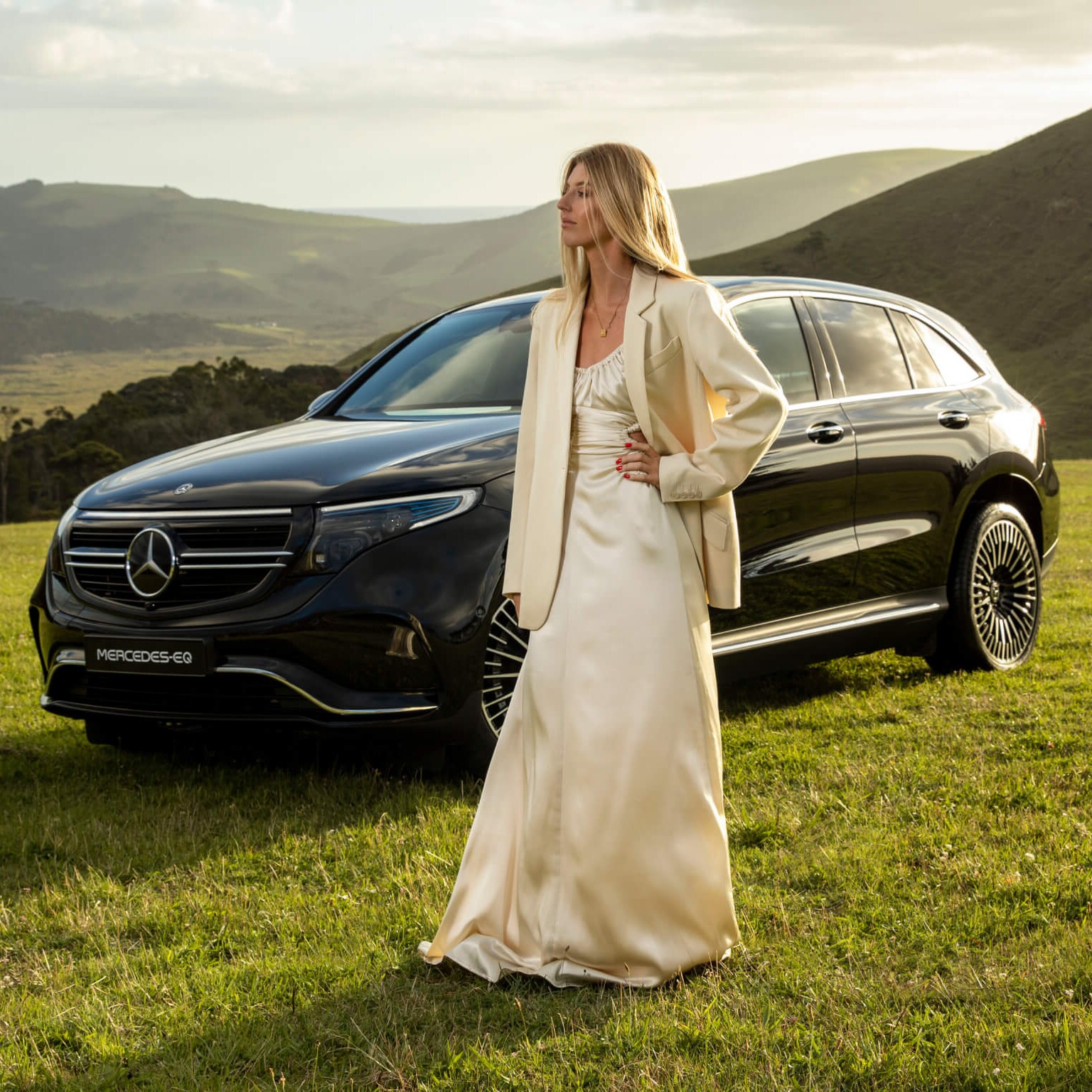 Maggie Marilyn founder Maggie Hewitt with the Mercedes-Benz EQC