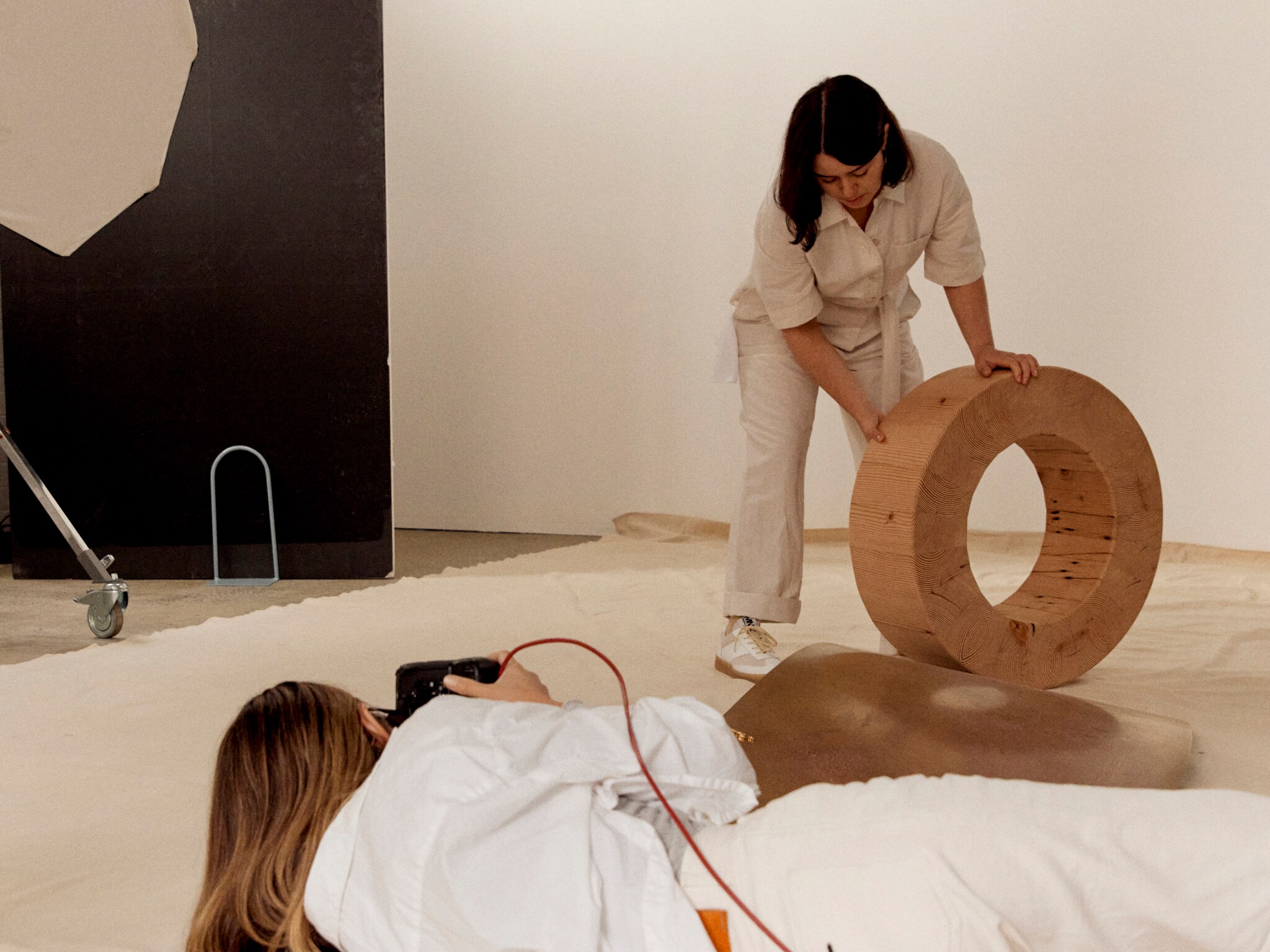 Set designer Natalie Turnbull and photographer Victoria Zschommler on set.