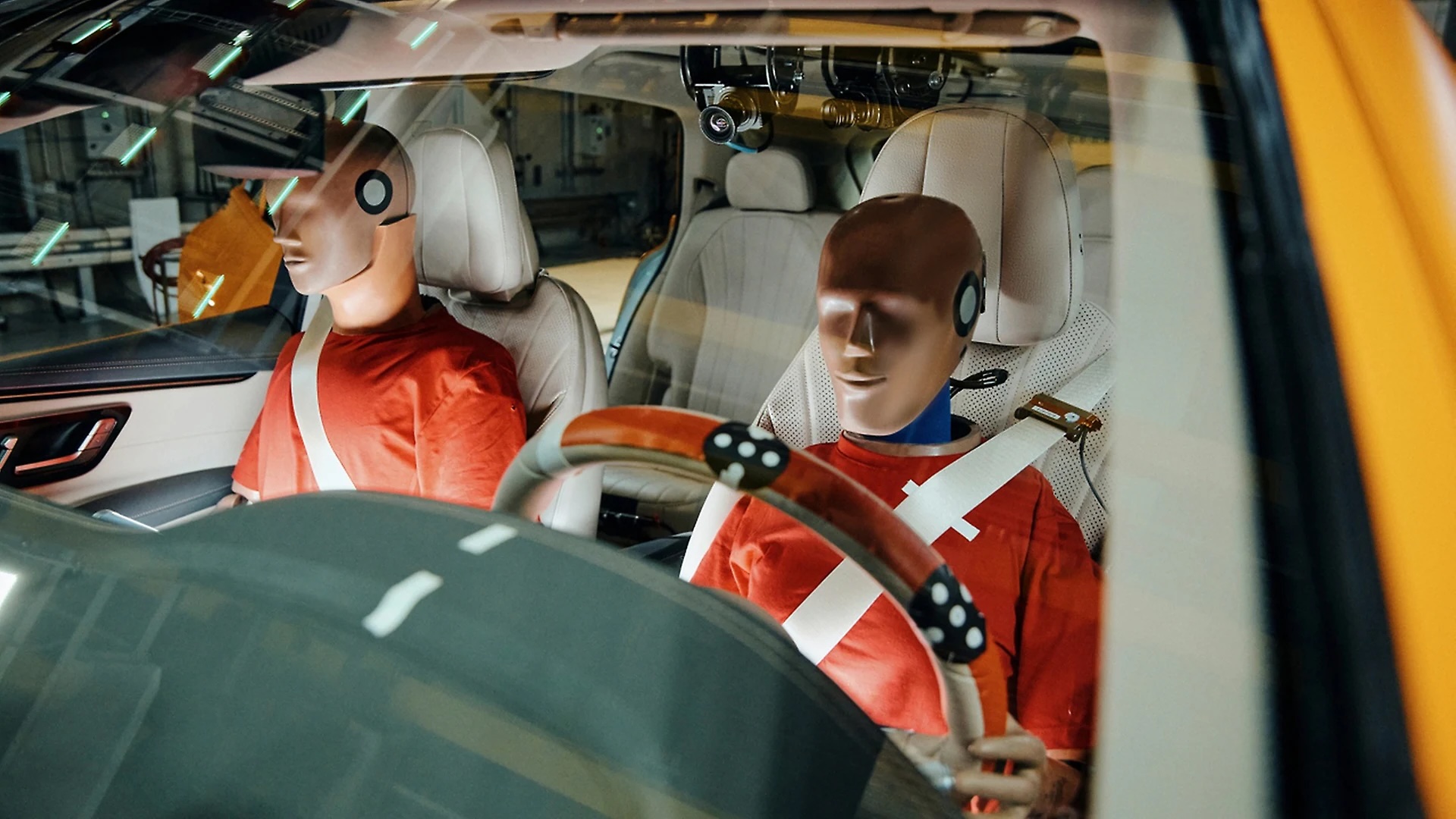 Dummies in a crash-test vehicle Dummies in a crash-test vehicle