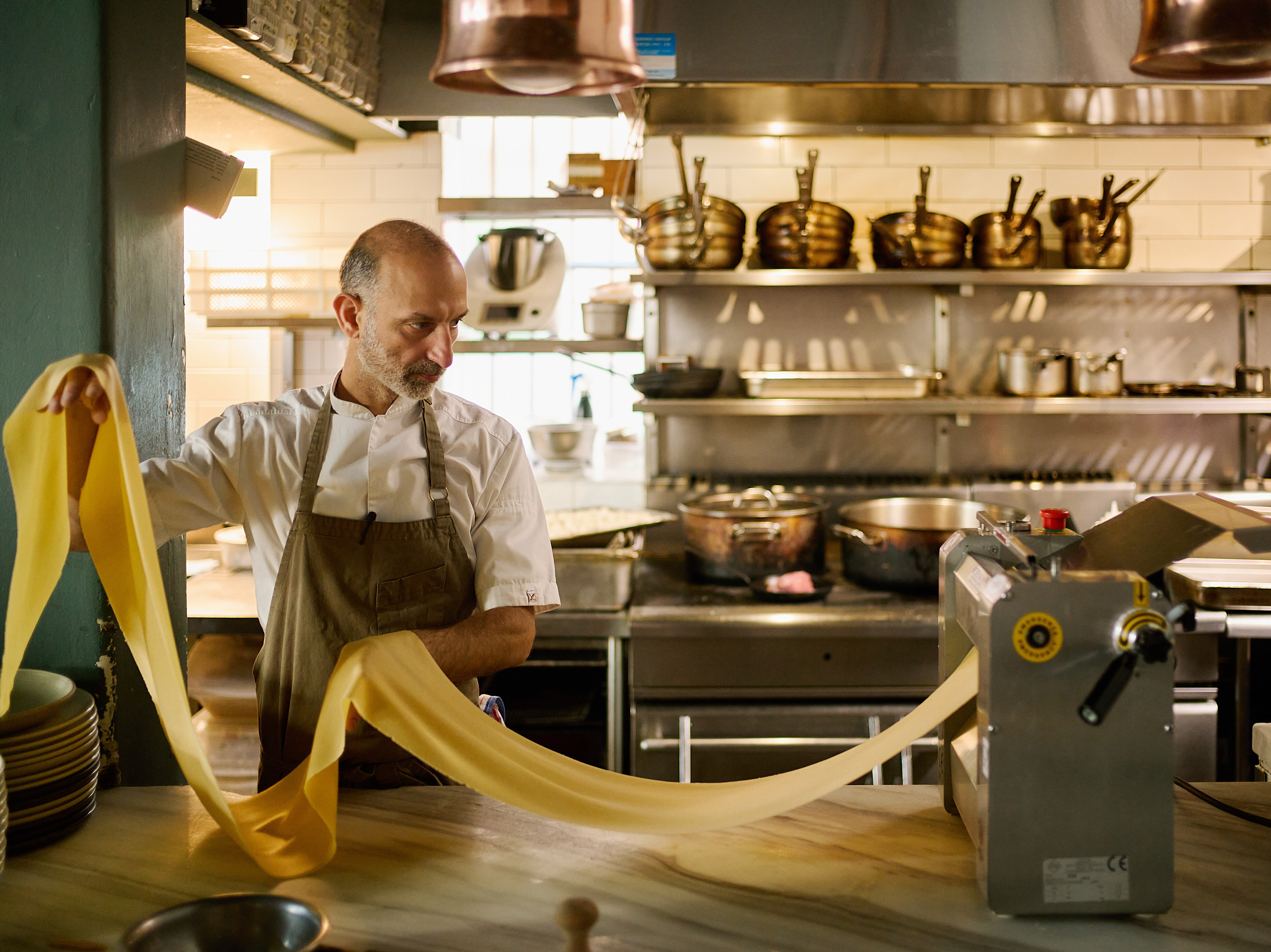 Chef Andreas Papadakis making pasta by hand
