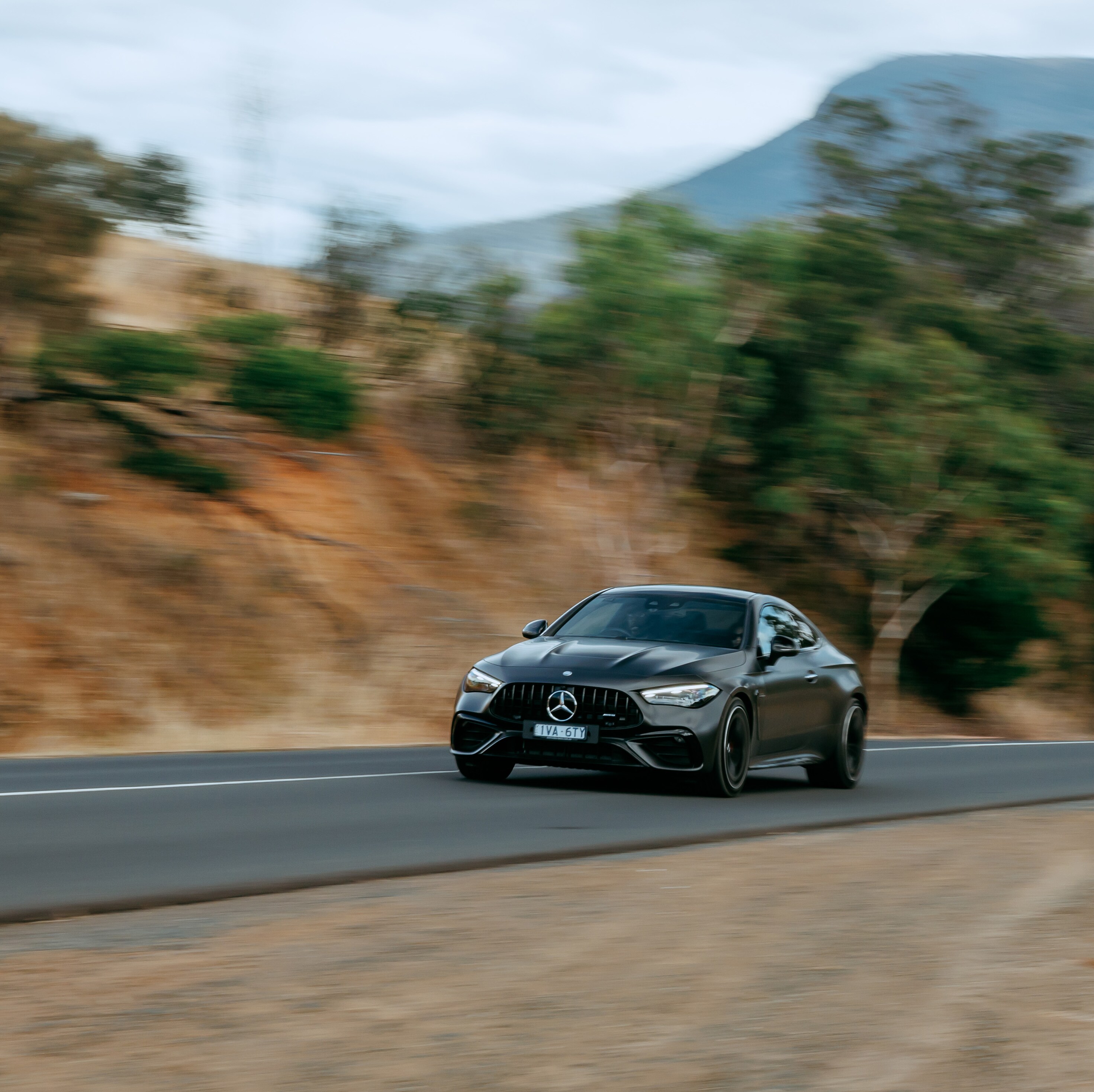 Mercedes-AMG CLE 53 4MATIC Coupé driving on a road. Image credit/photographer: Alastair Brook