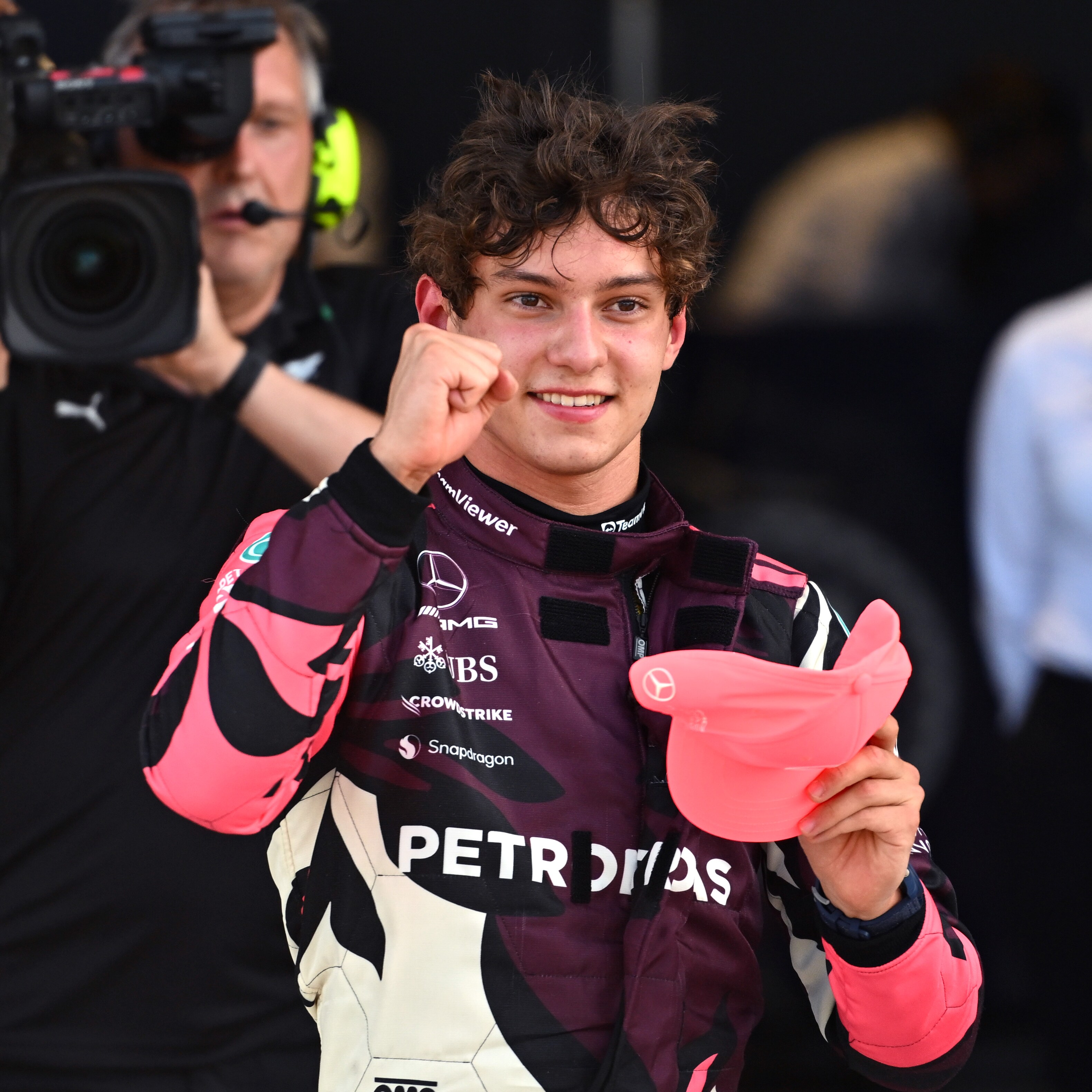 Andrea Kimi Antonelli smiling with his fist in the air