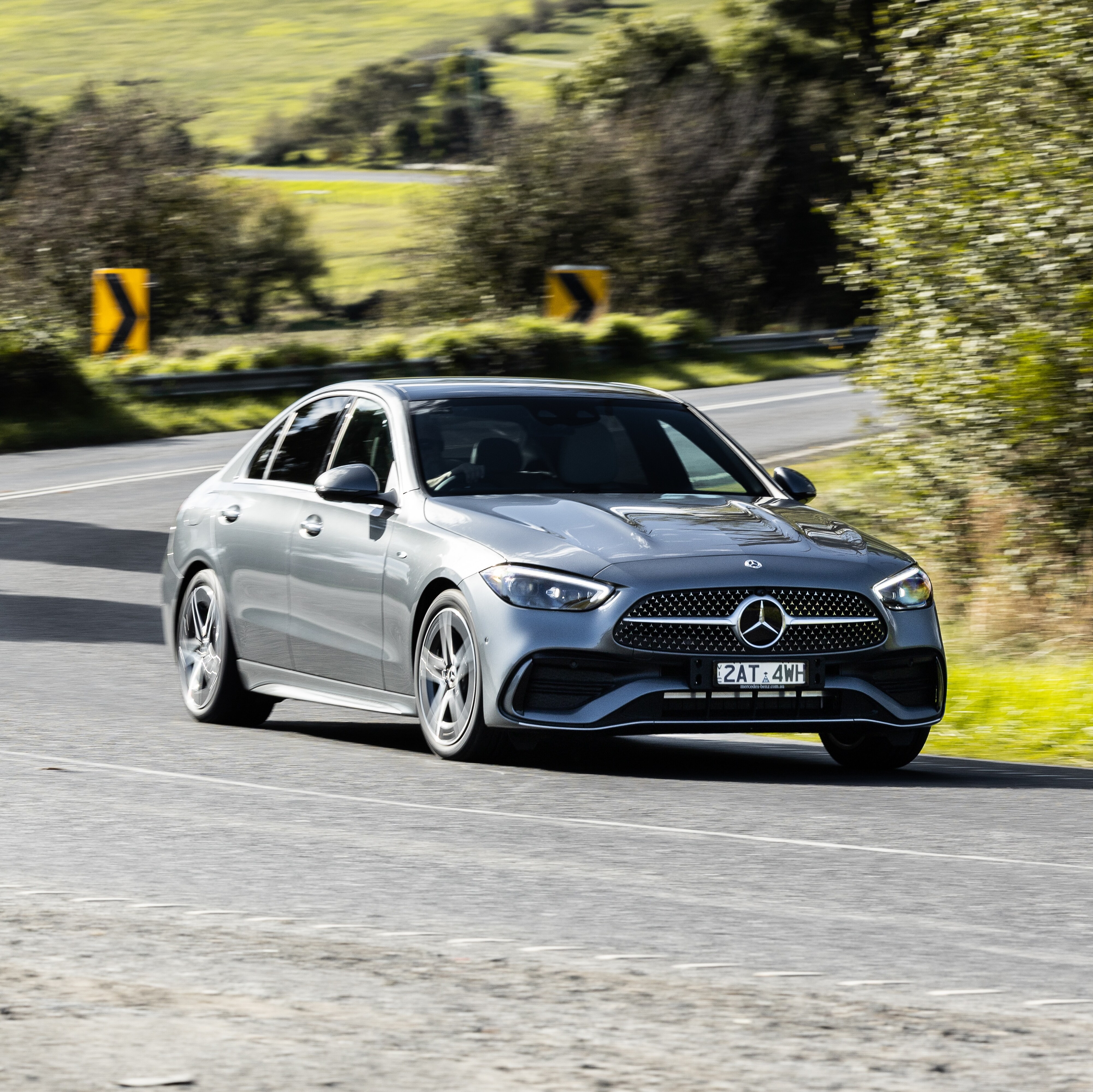 Mercedes-Benz C 350e driving down a road. Image credit/photographer: Nathan Jacobs