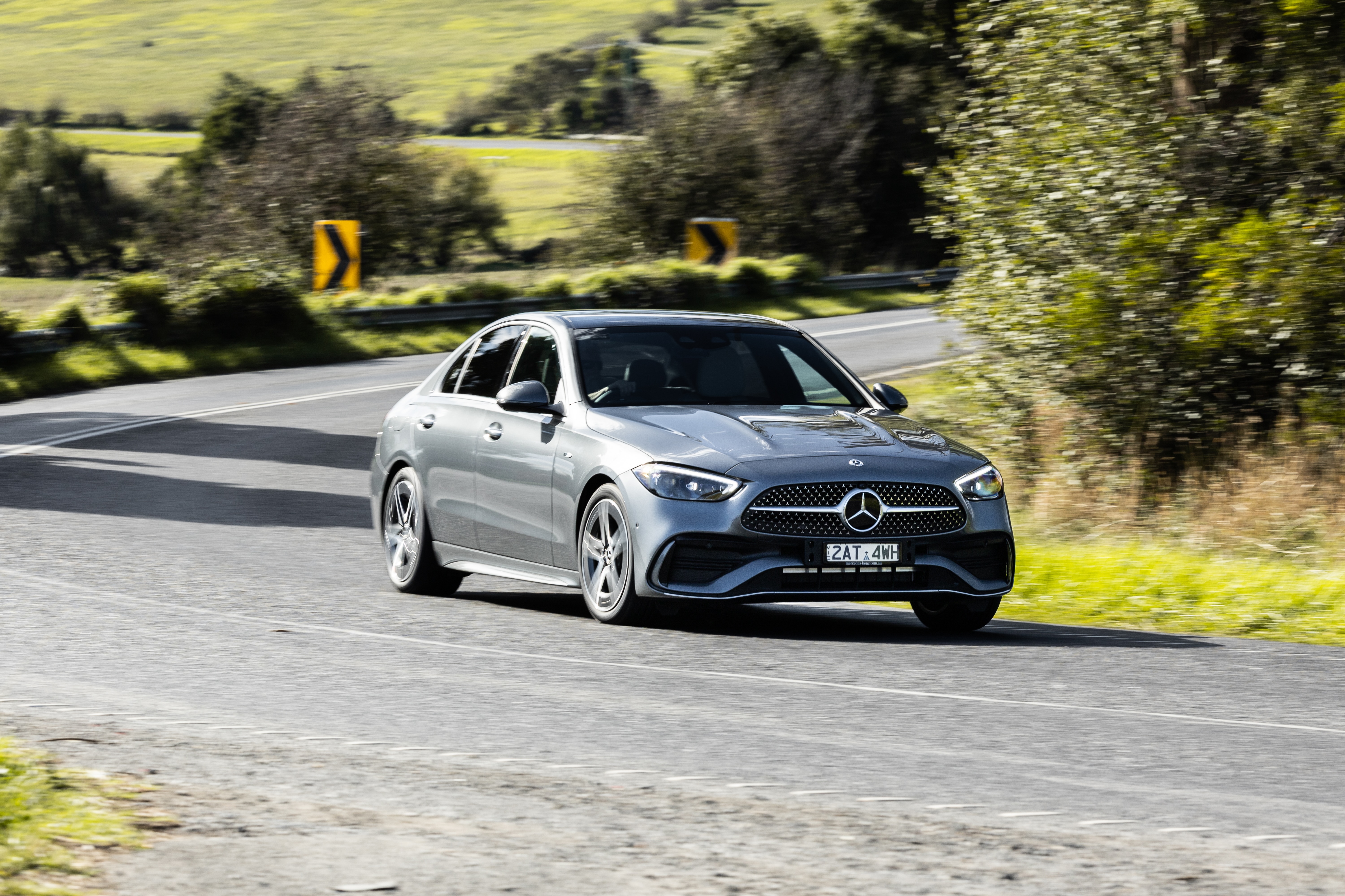 Mercedes-Benz C 350e Mercedes-Benz C 350e driving down a road. Image credit/photographer: Nathan Jacobs