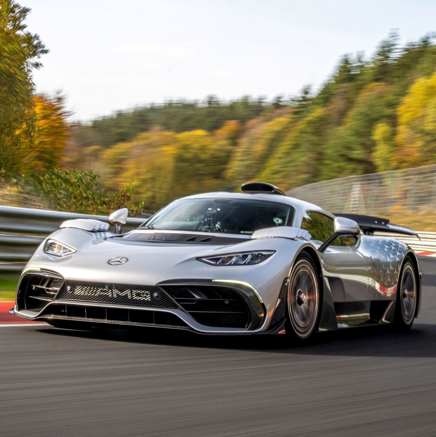 F1-inspired Mercedes-AMG ONE hypercar racing around the track. Overseas model shown. Image credit/photographer: Mercedes Benz Group AG.