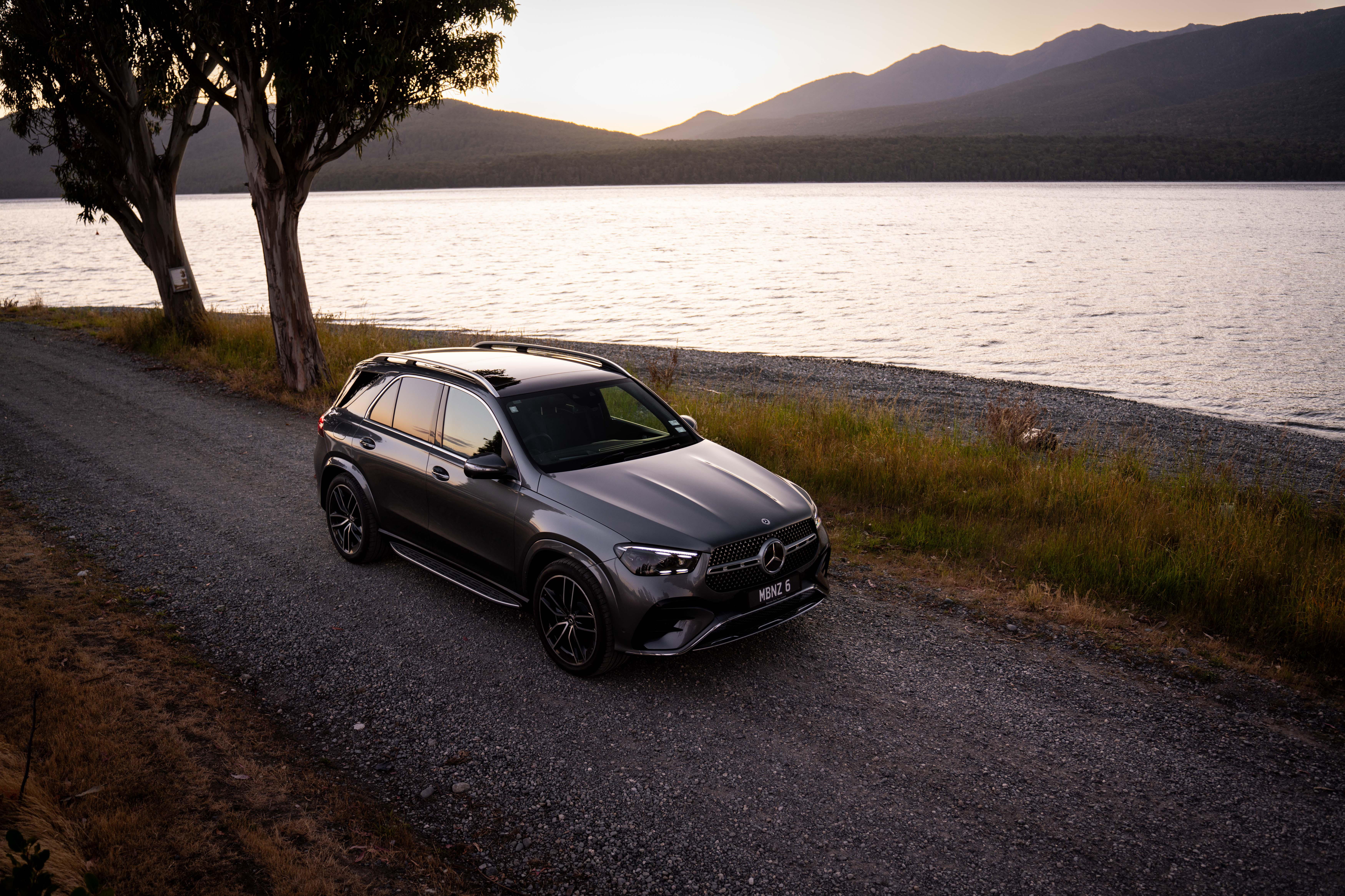 GLE SUV GLE SUV parked beside a pictureque river view