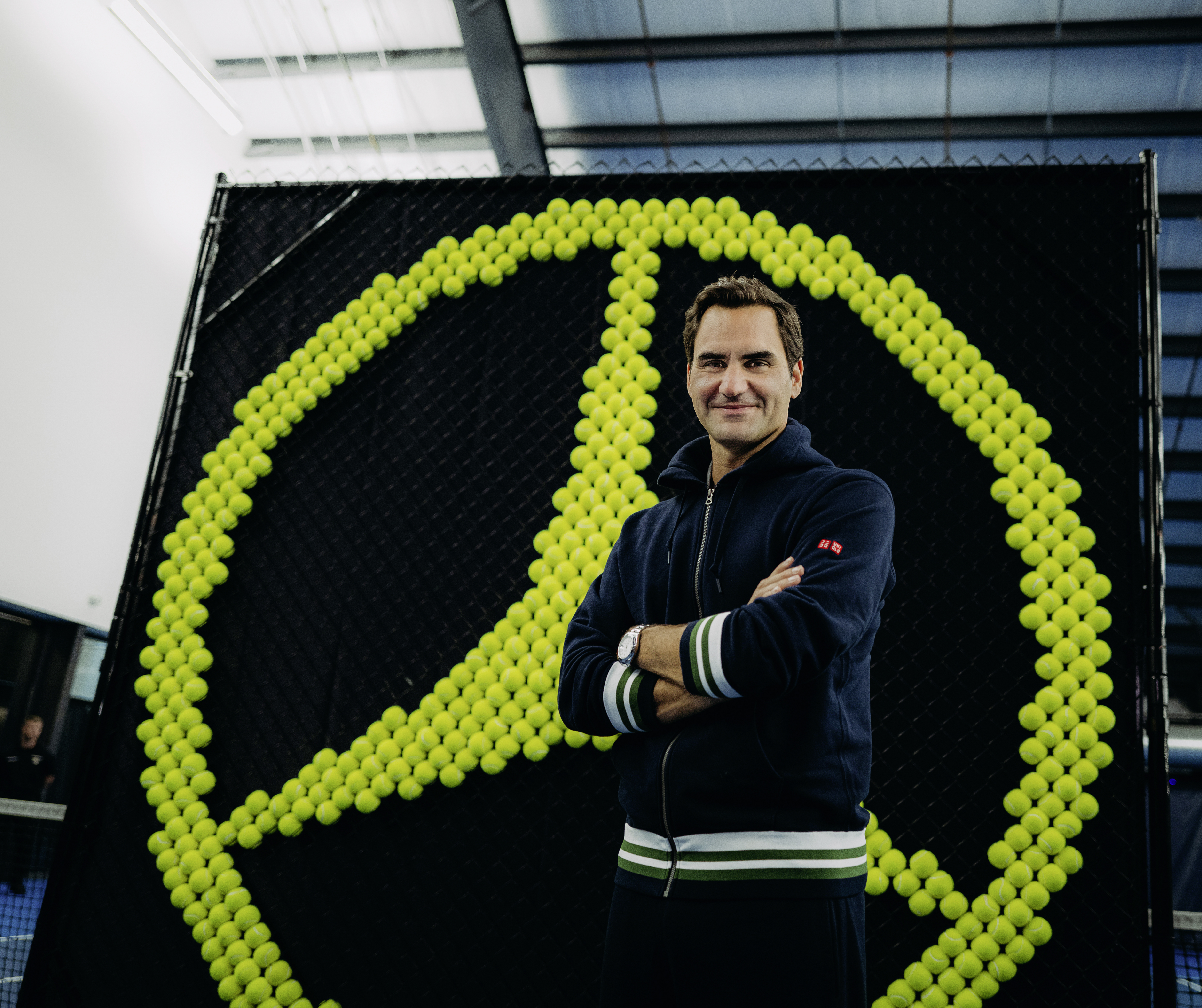 Roger Federer Selfie Roger Federer taking a selfie with two Mercedes-Benz cars at the back