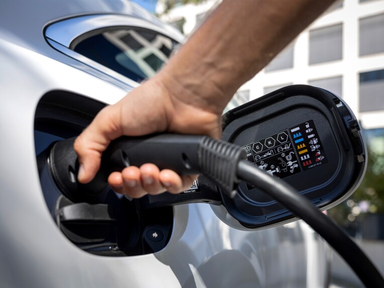 Electric car being charged