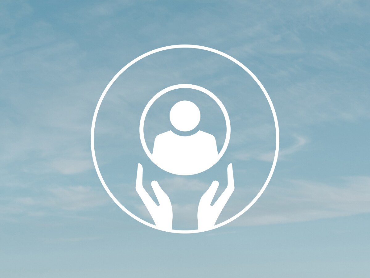 Icon with two hands supporting a human silhouette
