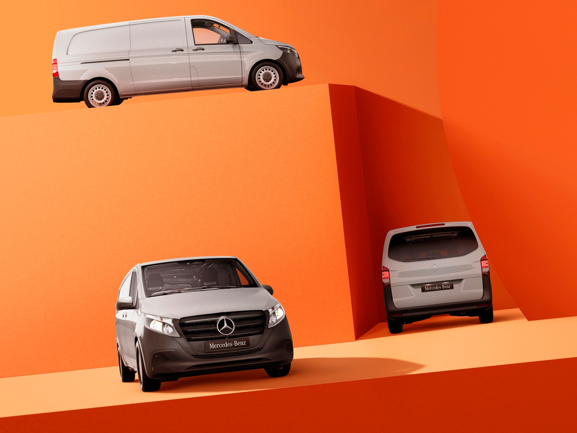 Various Mercedes-Benz Vito 114s against orange backdrop