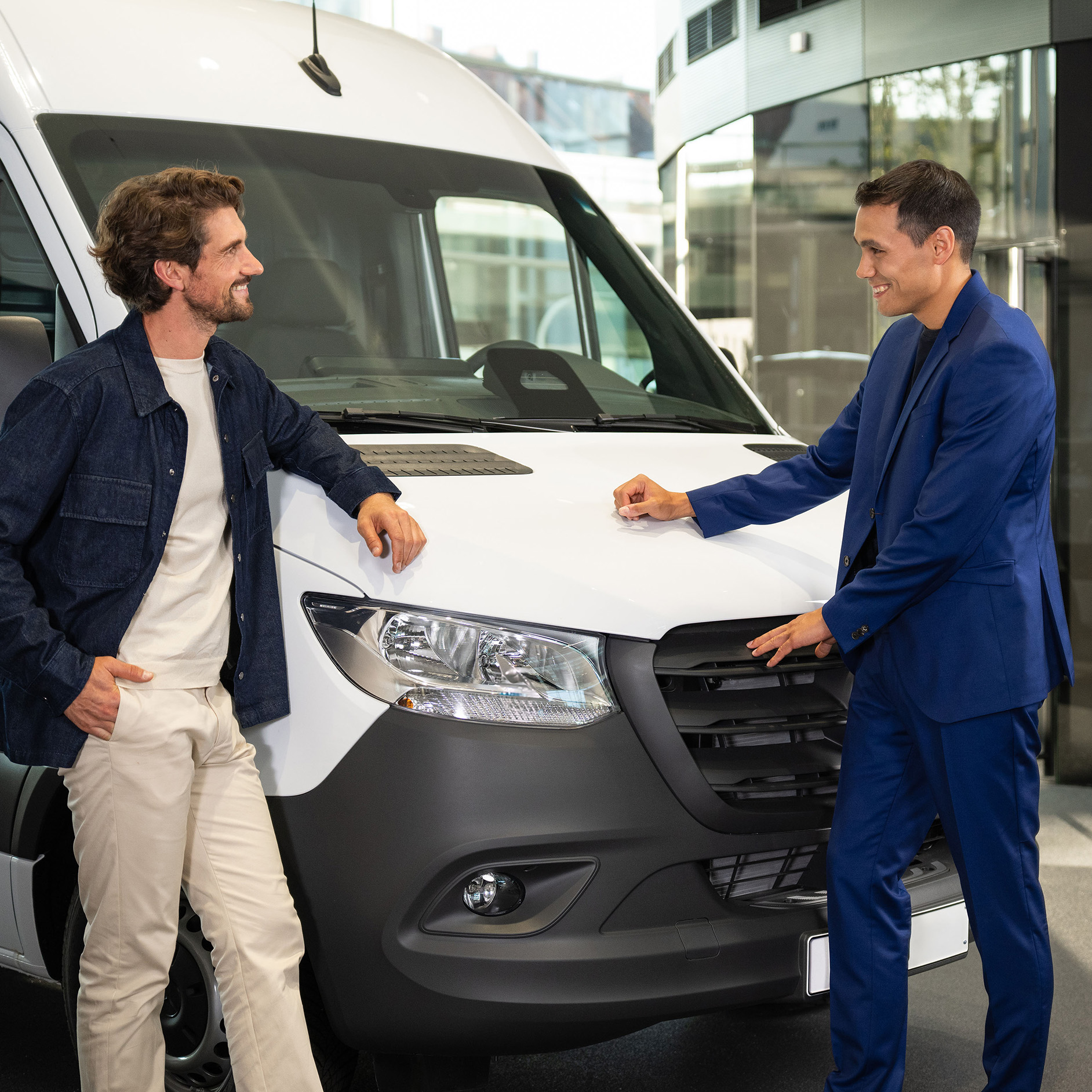 Mercedes-Benz Vans Sprinter Two men standing in front of a Mercedes-Benz Sprinter