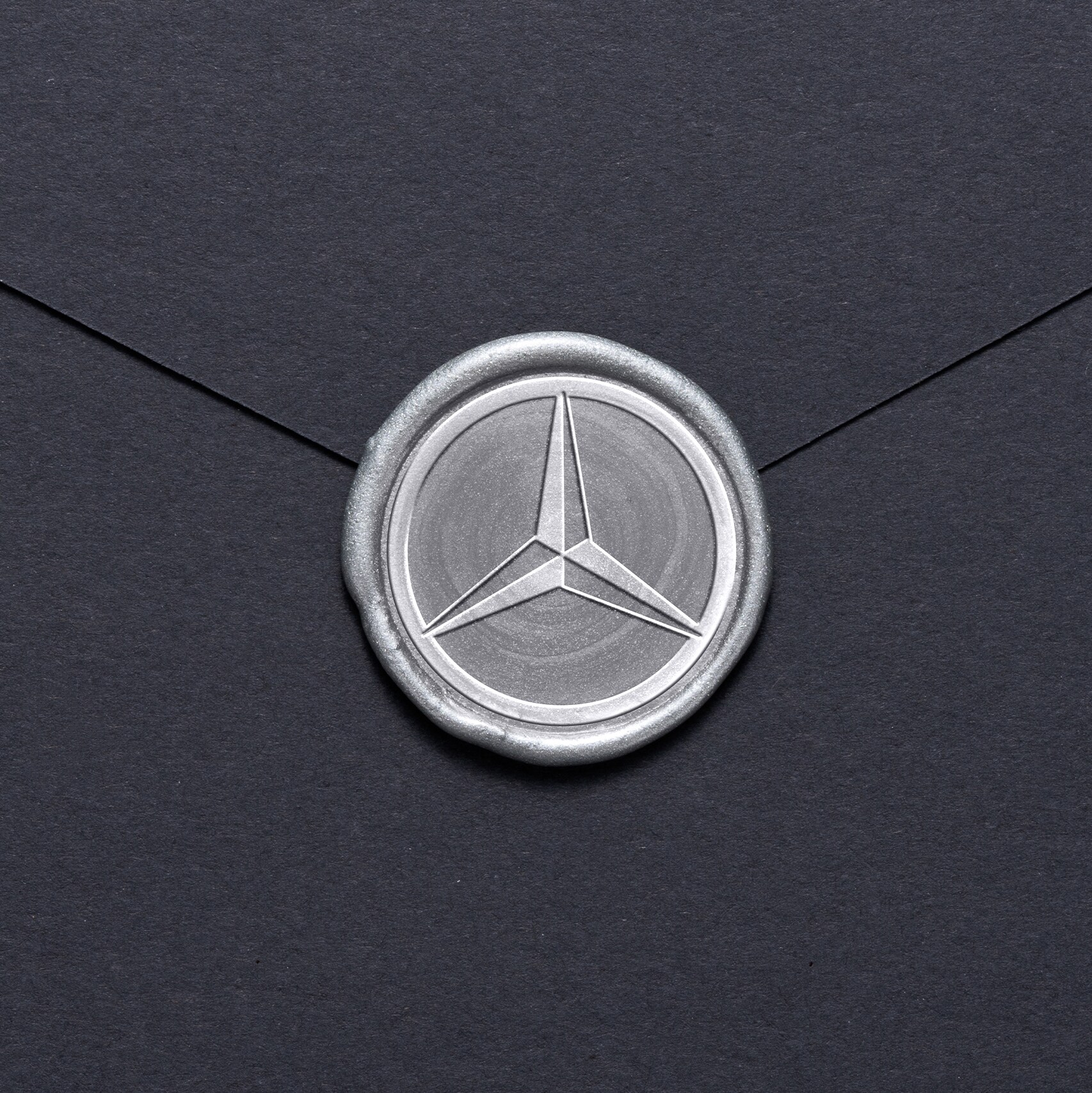 Mercedes-Benz emblem on an envelope