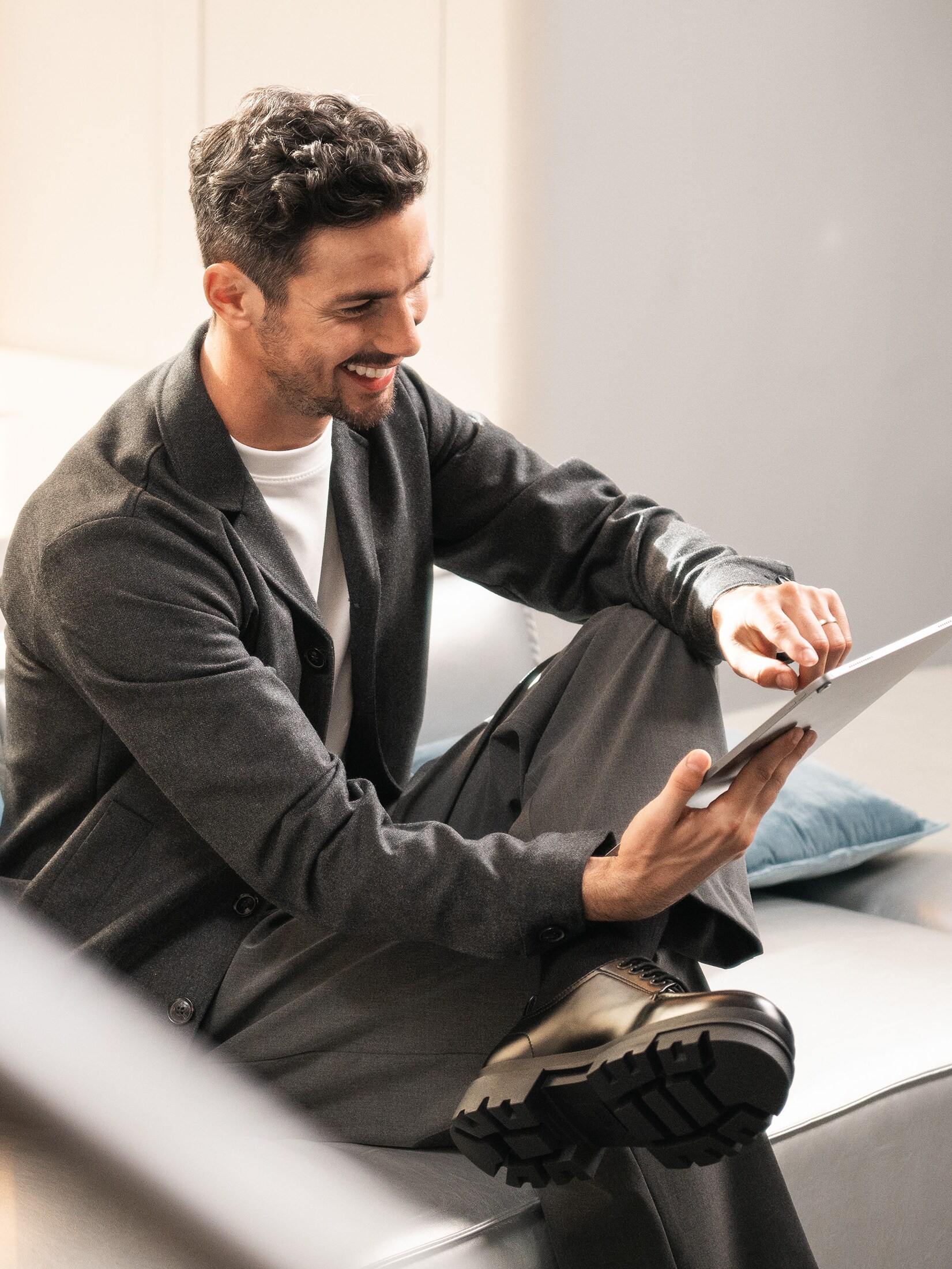 A man holding a tablet