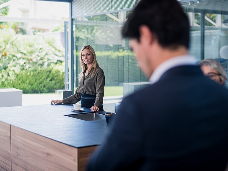 A woman and a man during leasing advice.