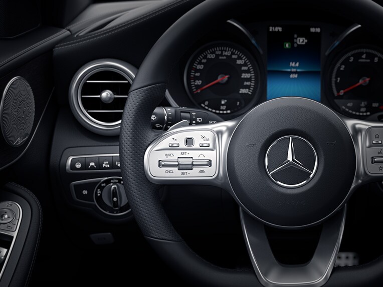 The steering wheel in the Mercedes-Benz C-Class Cabriolet.