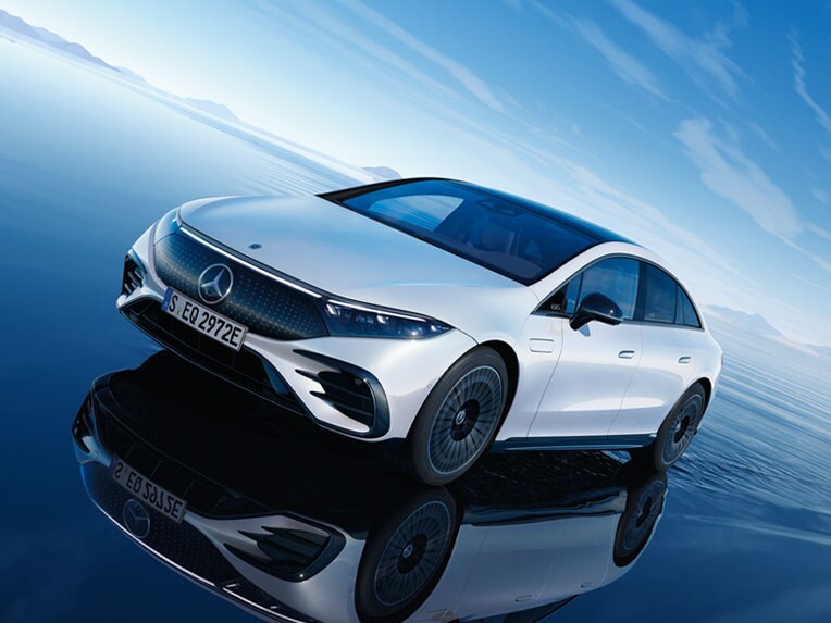 The EQS by Mercedes-Benz in a side front view.