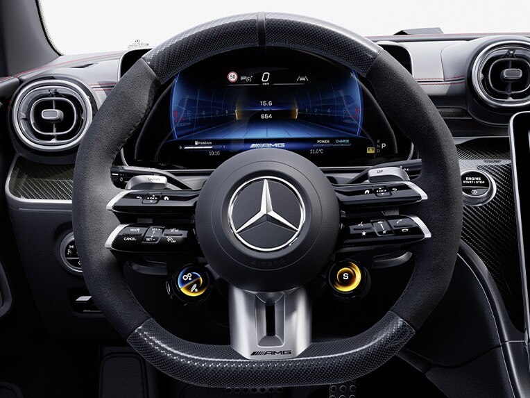 The AMG Performance steering wheel in carbon-fibre design / MICROCUT microfibre in the CLE Cabriolet from Mercedes-AMG.