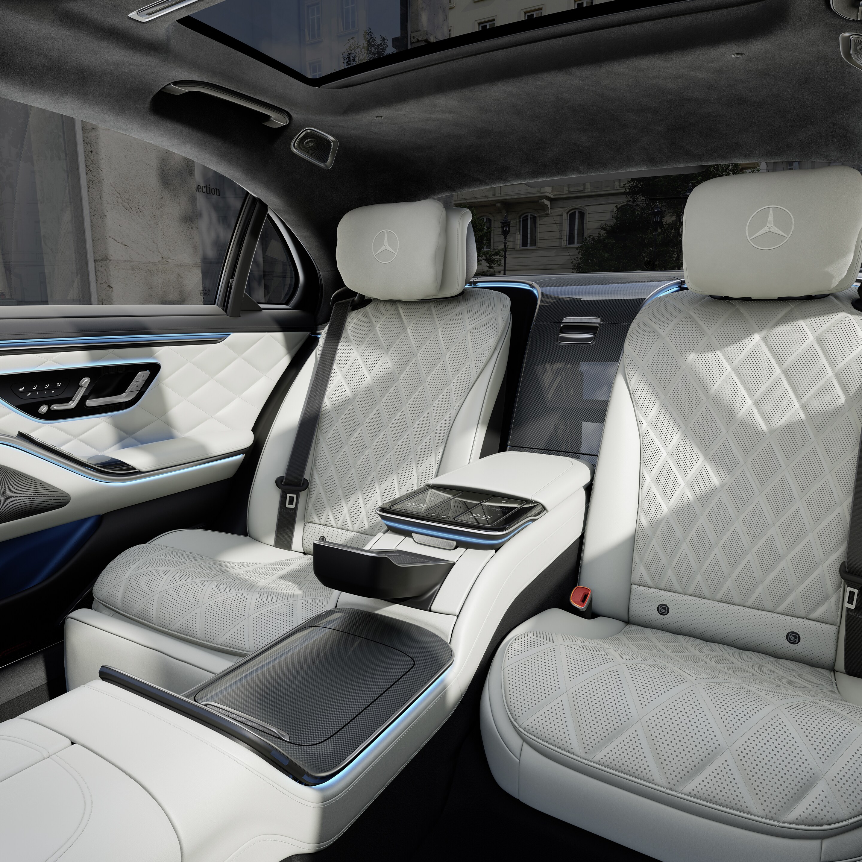 The cockpit of the new Mercedes-Benz Saloon Long shown from between the two front seats.