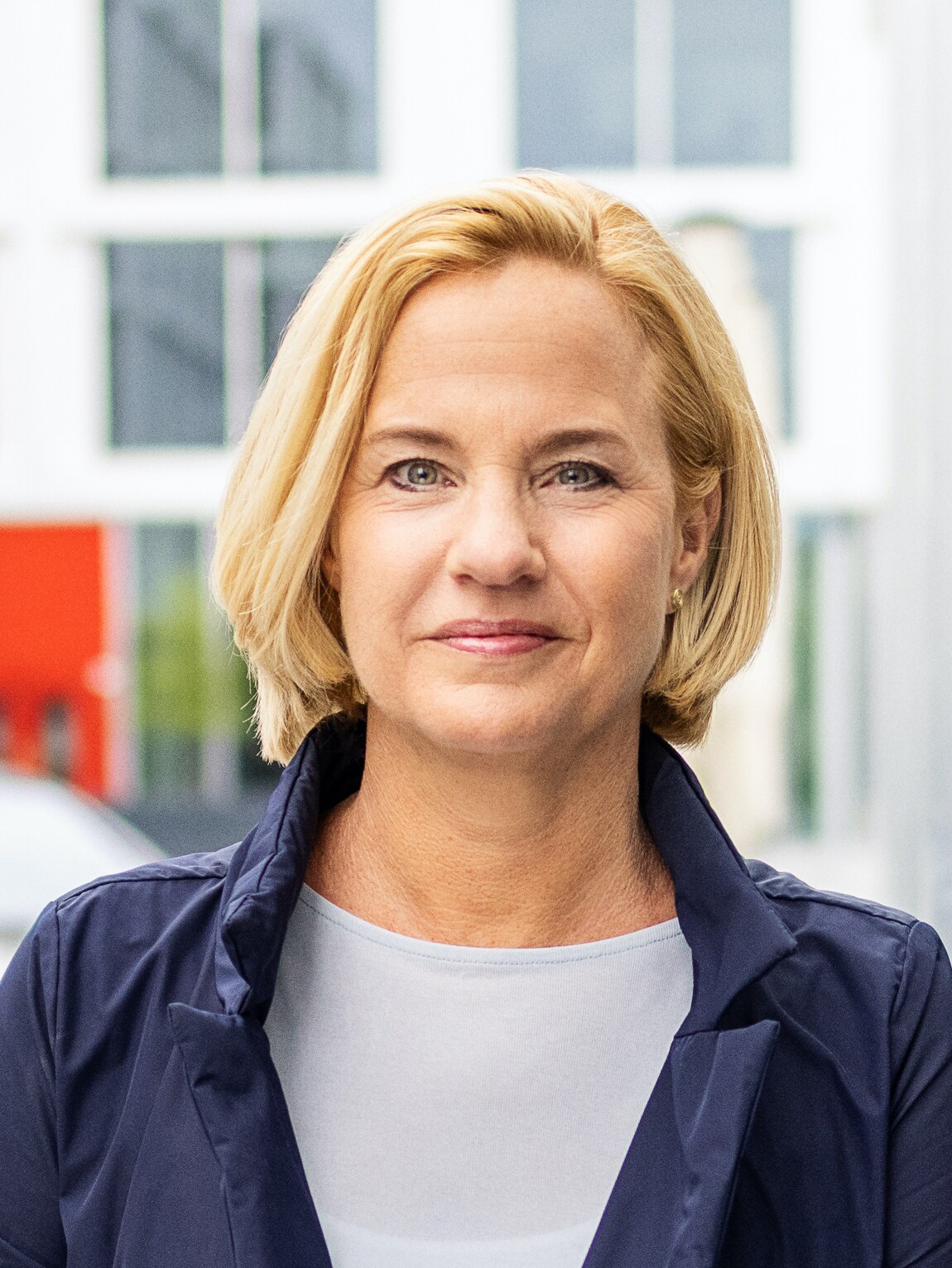 The image shows Britta Seeger, Board Member for Sales, Mercedes-Benz Cars.