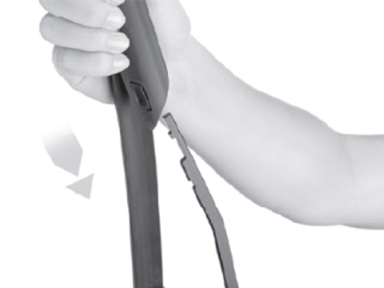 Push the wiper blade forward until the release button engages.