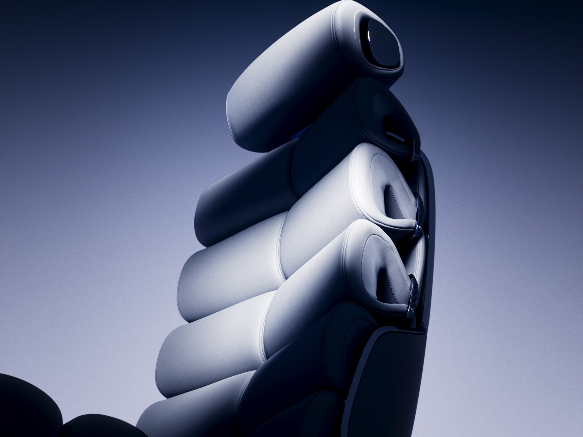 The two luxurious seats in the rear passenger compartment of the Vision V in a reclining position.