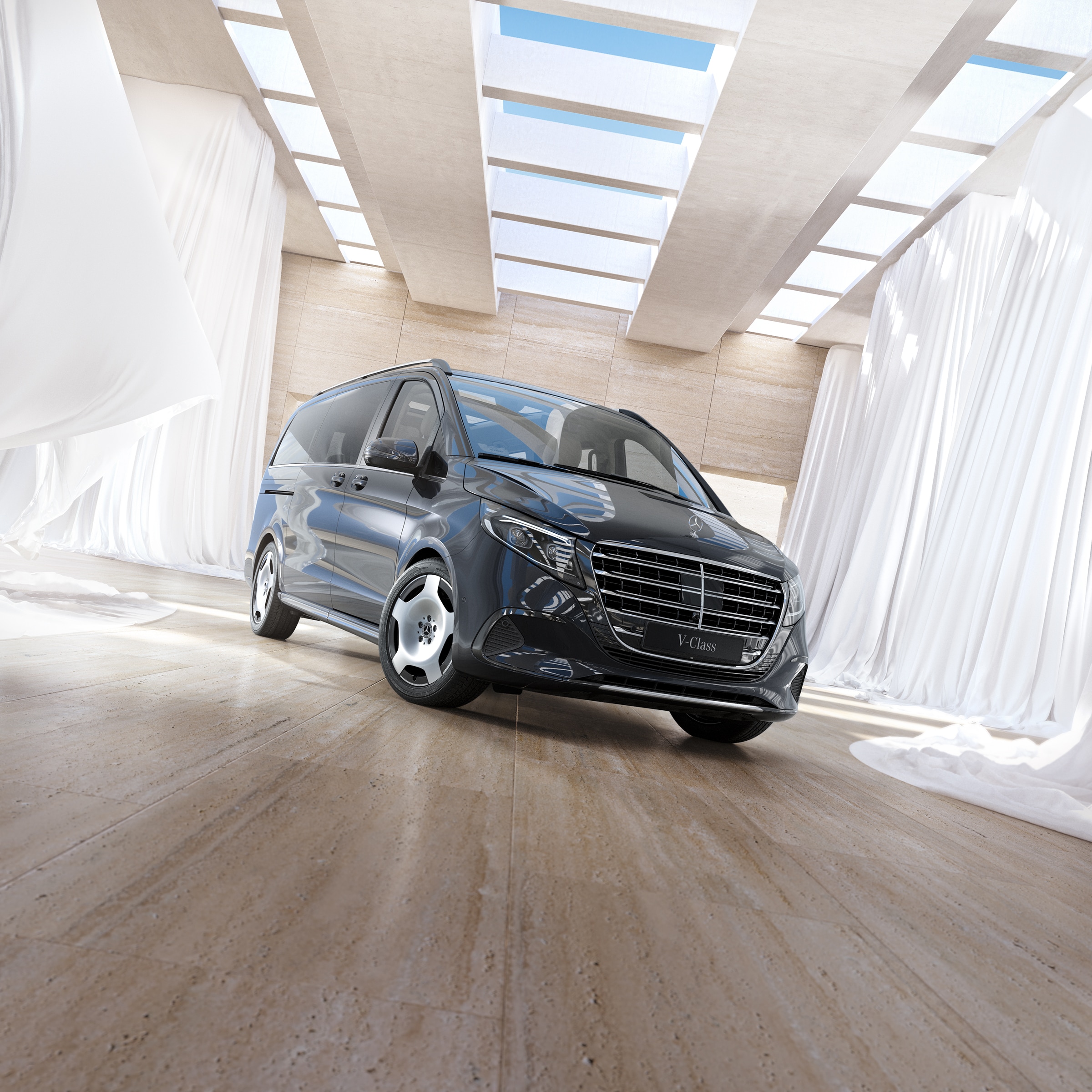 V-Class | Commercial Vehicles History | Mercedes-Benz Mercedes-Benz V-Class passenger van positioned in bright modern interior with skylights