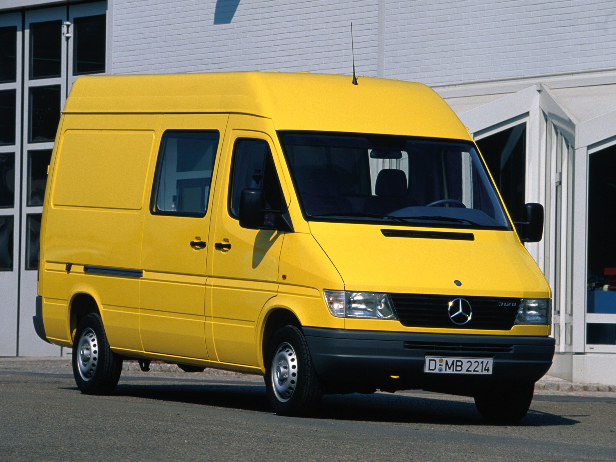 First generation Sprinter parked outside industrial building