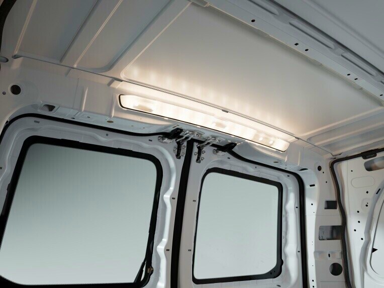 The LED light strip in the load compartment is located in a high position at the rear in such a manner that the load compartment is illuminated with a minimum of shadow.