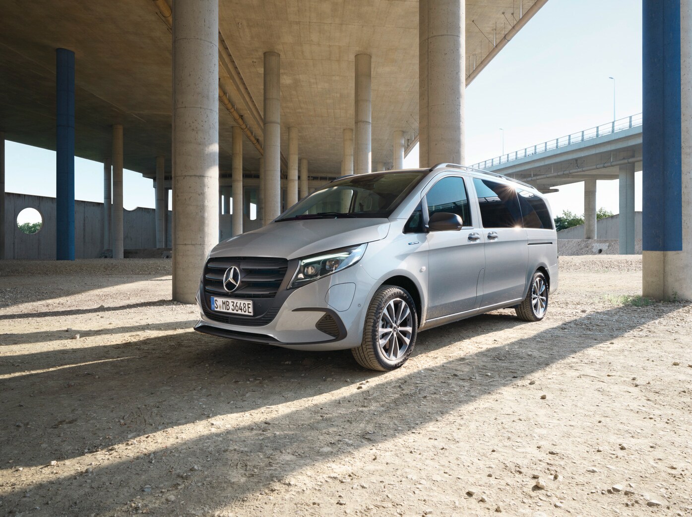 The eVito Tourer standing under a bridge.